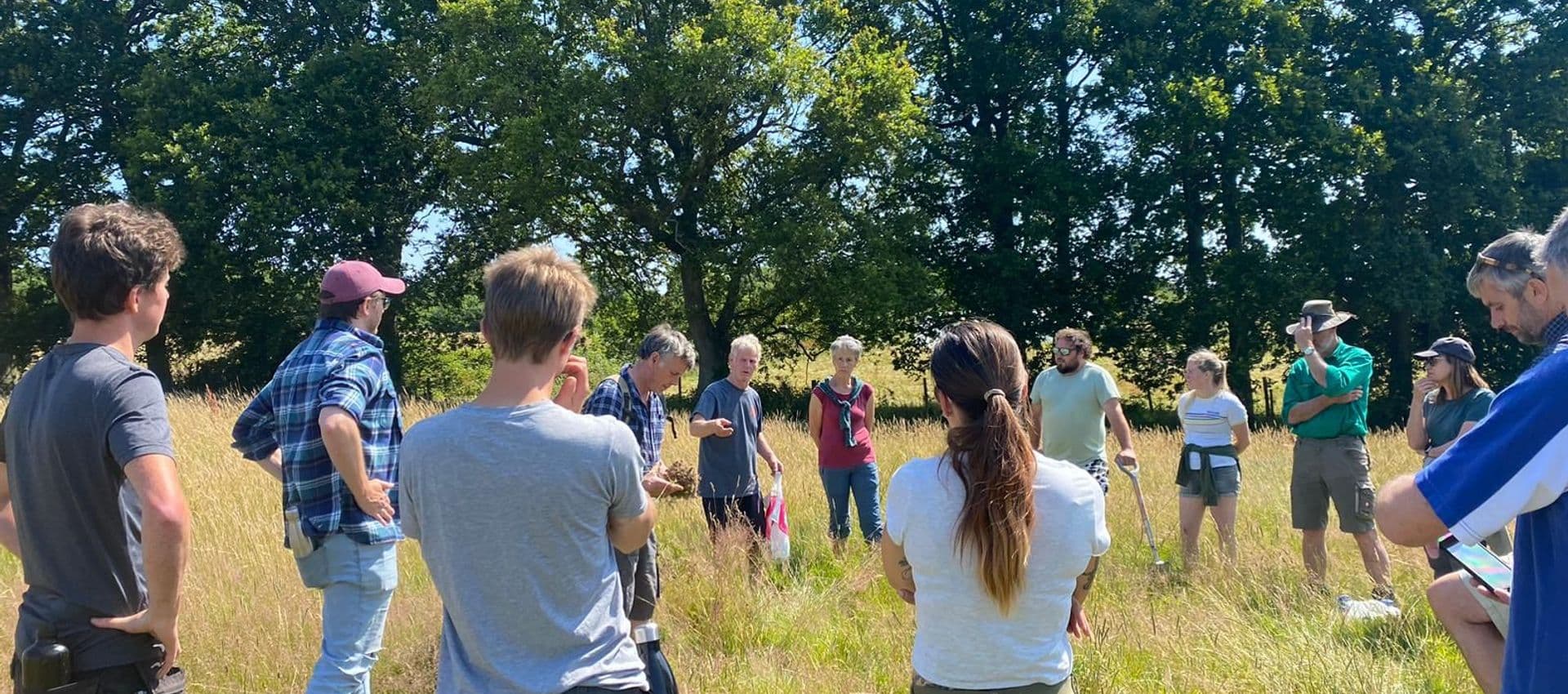 Group watching soil testing